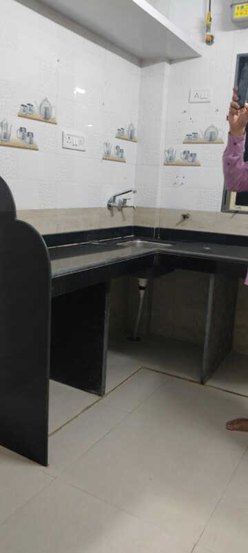 Kitchen in 1 BHK Apartment at Shree Ashtavinayak CHS Seawoods, Seawoods – for Rent