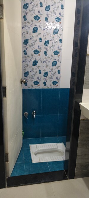 Bathroom in 1 BHK Apartment at Shree Ashtavinayak CHS Seawoods, Seawoods – for Rent