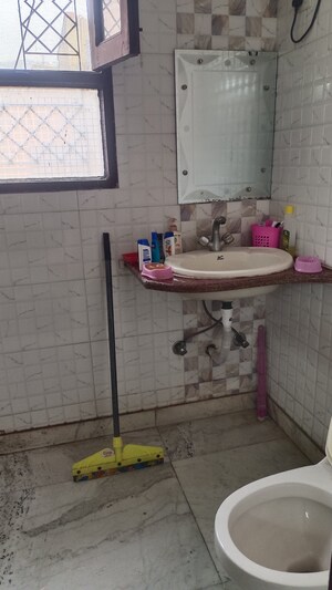 Bathroom in 3 BHK Builder Floor at New Rajinder Nagar – for Sale