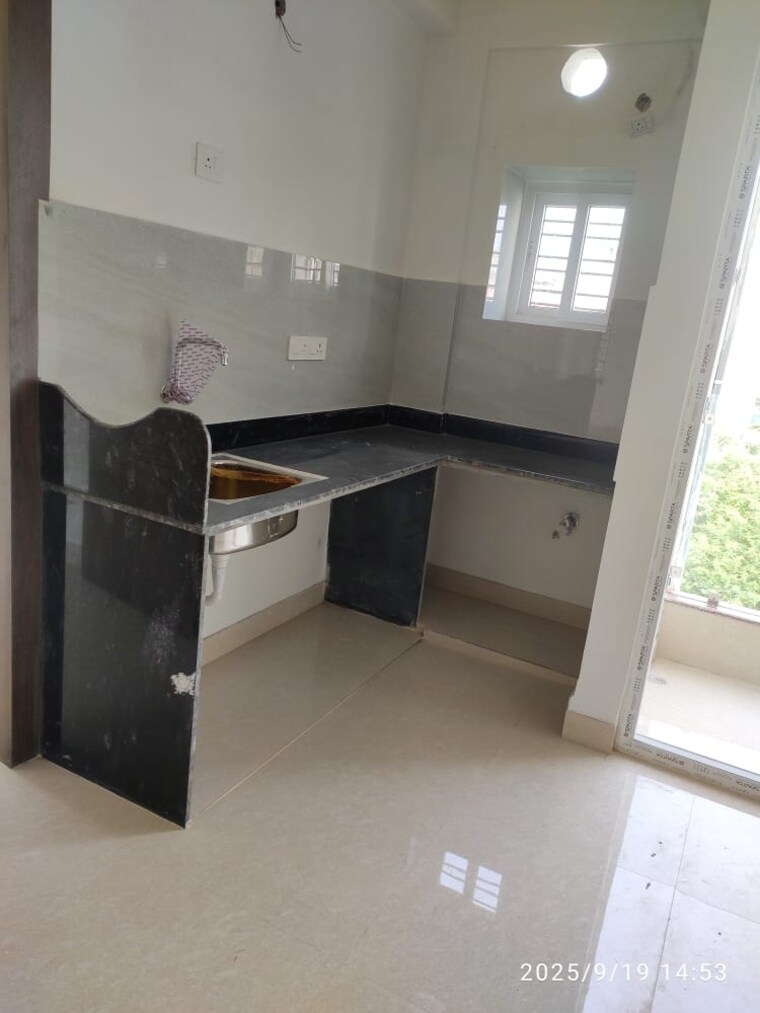 Kitchen, the-ecos 3 Bedroom 1450 Sq.Ft. Apartment In New Town Kolkata 9625393