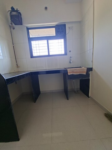 Kitchen in 1 BHK Apartment at Raunak Heights, Ghodbunder Road – for Rent