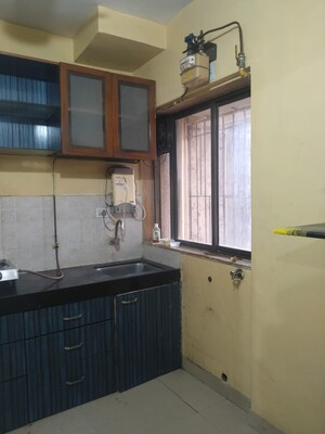 Kitchen in 2 BHK Apartment at Runwal Garden City, Balkum Pada – for Rent