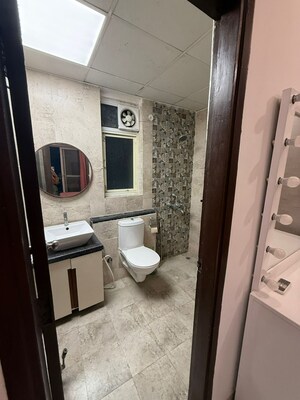 Bathroom in 2 BHK Apartment at Mahagun Mirabella, Sector 79 – for Rent