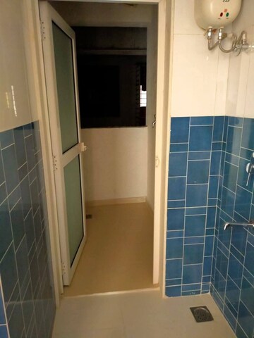 Bathroom in 1 BHK Apartment at Lodha Amara, Kolshet Road – for Rent