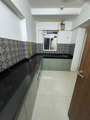 Kitchen in 2 BHK Apartment at Lodha Amara, Kolshet Road – for Sale