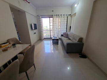 Living Room in 1 BHK Apartment at Raunak Bliss, Ghodbunder Road – for Rent