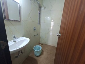 Bathroom in 1 BHK Apartment at Raunak Bliss, Ghodbunder Road – for Rent