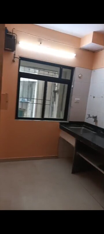 Kitchen in 1 BHK Apartment at Acme Harmony Chs Ltd, Andheri East – for Rent