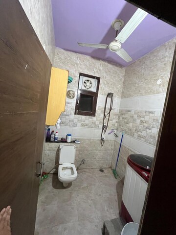 Bathroom in 3 BHK Builder Floor at Guru Nanak Enclave, Dhakoli – for Sale