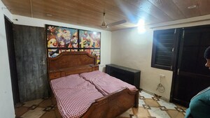 Bedroom in 3 BHK Builder Floor at Guru Nanak Enclave, Dhakoli – for Sale
