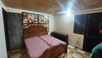 Bedroom in 3 BHK Builder Floor at Guru Nanak Enclave, Dhakoli – for Sale