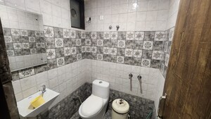 Bathroom in 3 BHK Builder Floor at Guru Nanak Enclave, Dhakoli – for Sale