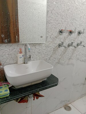 Bathroom in 1.5 BHK Builder Floor at Ansals Sushant City – for Rent