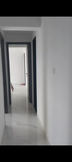 Building Lobby in 2 BHK Apartment at Dev Leo Tower, Oshiwara – for Rent