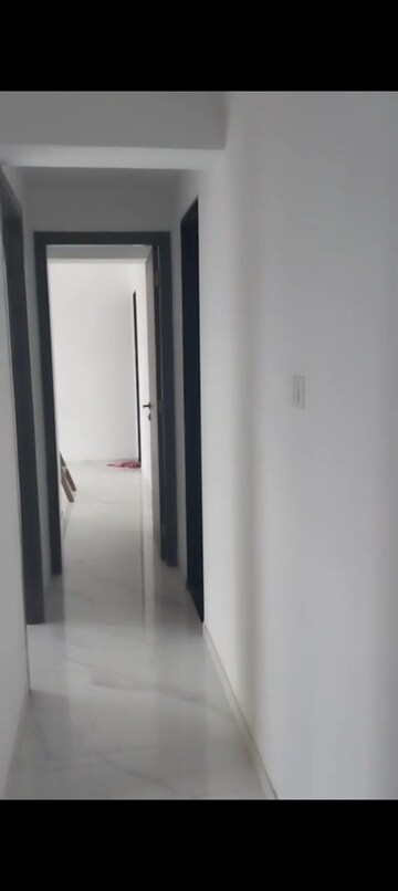 Building Lobby in 2 BHK Apartment at Dev Leo Tower, Oshiwara – for Rent