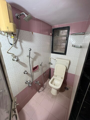 Bathroom in 2 BHK Apartment at Trishul Terraces, Kopar Khairane – for Rent