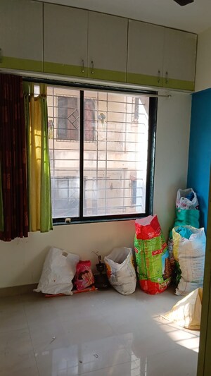 Room in 2 BHK Apartment at Swojas Samen, Kothrud – for Rent