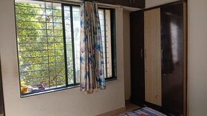 Bedroom in 2 BHK Apartment at Swojas Samen, Kothrud – for Rent