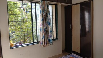 Bedroom in 2 BHK Apartment at Swojas Samen, Kothrud – for Rent