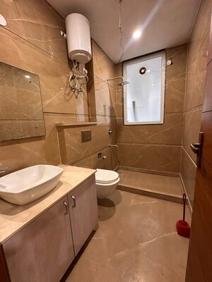 Bathroom in 3 BHK Apartment at Freedom Fighters Enclave – for Rent