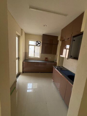 Kitchen in 4 BHK Apartment at Piedmont Taksila Heights, Sector 37c – for Rent
