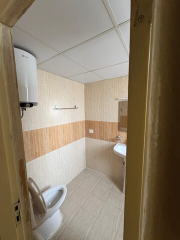 Bathroom in 4 BHK Apartment at Piedmont Taksila Heights, Sector 37c – for Rent