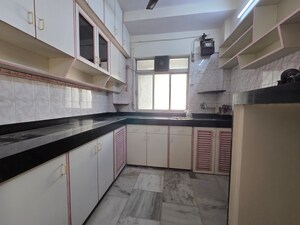 Kitchen in 2 BHK Apartment at Riddhi Garden, Malad East – for Rent