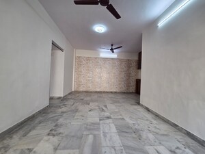 Room in 2 BHK Apartment at Riddhi Garden, Malad East – for Rent