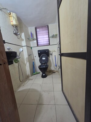 Master Bedroom in 2 BHK Apartment at Nav Jyotirling CHS, Malad East – for Sale