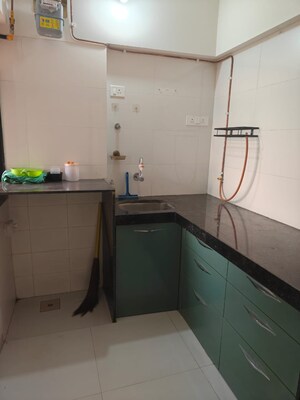 Kitchen in 2 BHK Apartment at Sahar Tower, Andheri East – for Rent