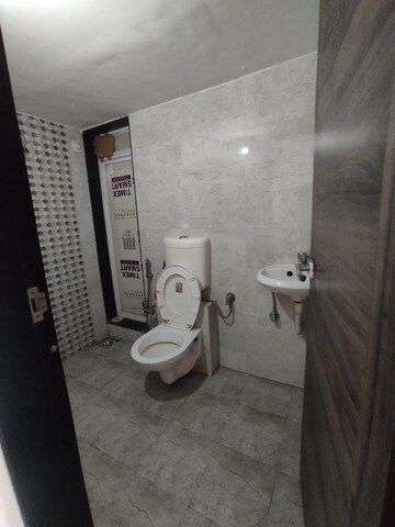 Bathroom in 4 BHK Apartment at Landcraft Golf Links, Pandav Nagar – for Rent