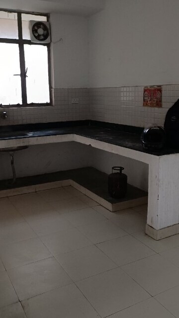 Kitchen in 2 BHK Apartment at Global Hill View, Sohna Sector 11 – for Sale