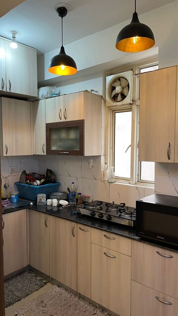 Kitchen in 2 BHK Apartment at Supertech Cape Town, Sector 74 – for Rent