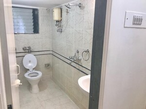 Bathroom in 1 BHK Apartment at Serenity Tower, Andheri West – for Sale