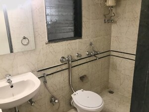 Bathroom in 1 BHK Apartment at Serenity Tower, Andheri West – for Sale