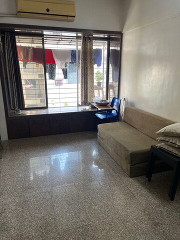Living Room in 1 BHK Apartment at Bhoomi Hills, Kandivali East – for Sale