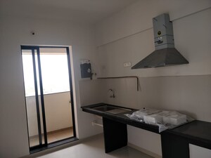 Kitchen in 3 BHK Apartment at Pride World City Kingsbury, Charholi Budruk – for Rent