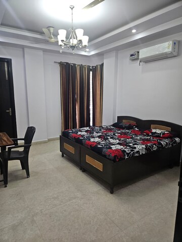 Bedroom in 4 BHK Builder Floor at Ansal Sushant Apartments, Sushant Lok I – for Rent