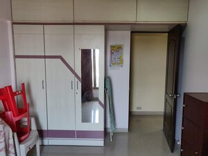 Bedroom in 3 BHK Apartment at Belvalkar Kalpak CHS, Dahanukar Colony – for Rent