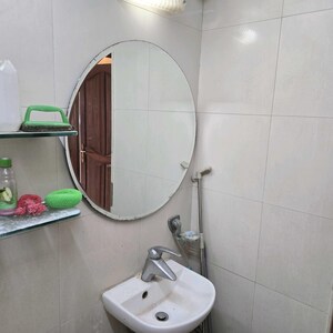 Bathroom in 4 BHK Apartment at Mahim West – for Sale