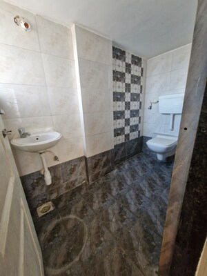 Bathroom in 2 BHK Apartment at Kini Tower, Virar West – for Sale