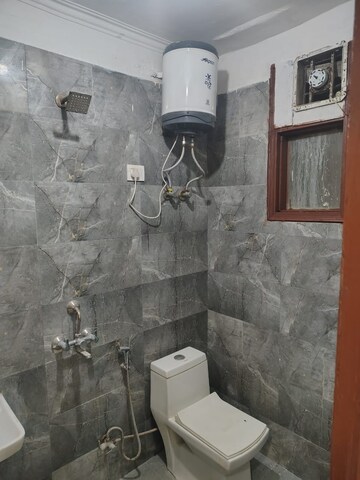 Bathroom in 1 BHK Builder Floor at Chattarpur – for Sale