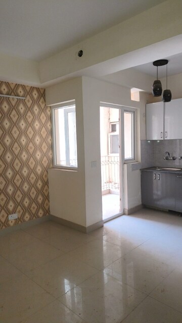 Room in 2 BHK Apartment at VIctoryone Amara, Sector 16 Greater Noida – for Sale