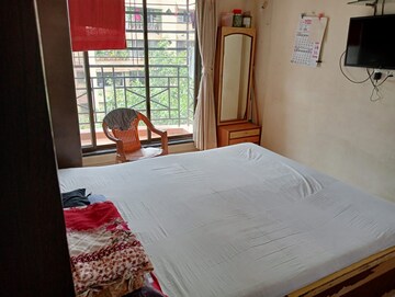 Bedroom in 3 BHK Apartment at Radha Vishweshwar Apartment, Kandivali West – for Sale