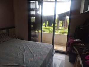 Bedroom in 2 BHK Apartment at Parande Woods, Dhanori – for Rent