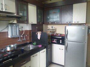 Kitchen in 2 BHK Apartment at Parande Woods, Dhanori – for Rent