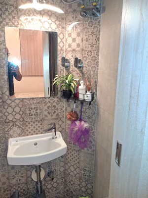 Bathroom in 1 BHK Apartment at Acres Avyan, Malad West – for Sale