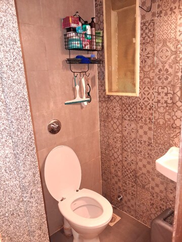Bathroom in 1 BHK Apartment at Acres Avyan, Malad West – for Sale