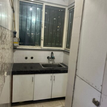 Kitchen in 3.5 BHK Apartment at Paramount Floraville, Sector 137 – for Rent