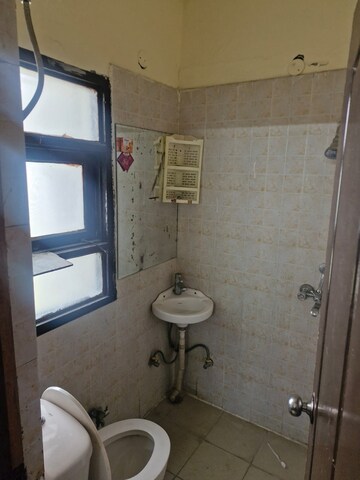 Bathroom in 1 RK Apartment at Jaipuria Sunrise Green, Lohgarh – for Rent